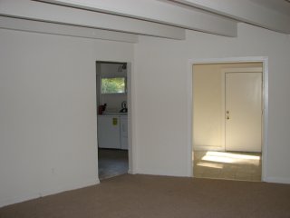 Looking toward dining room and kitchen